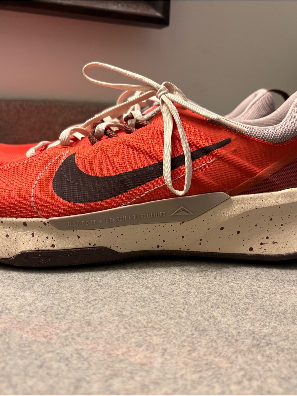 Nike Men’s Red Athletic Shoe with Black Swoosh